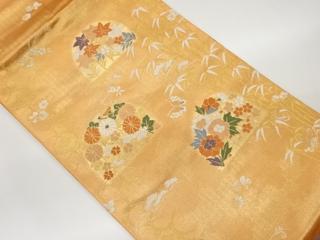 松竹梅に草花・亀甲・蝶模様織出し名古屋帯